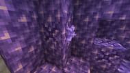 A budding amethyst with a young shard (Image via Minecraft 1.18)